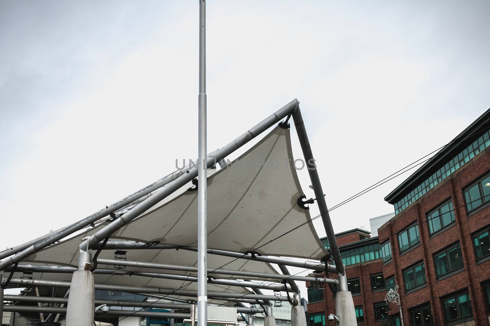 Dublin, Ireland - February 12, 2019: Street atmosphere and architecture before the DART Connolly train station in the city center on a winter day