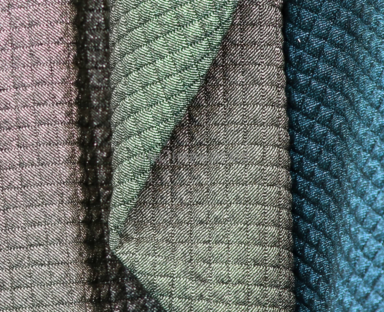 Detailed close up view on samples of cloth and fabrics in differ by MP_foto71