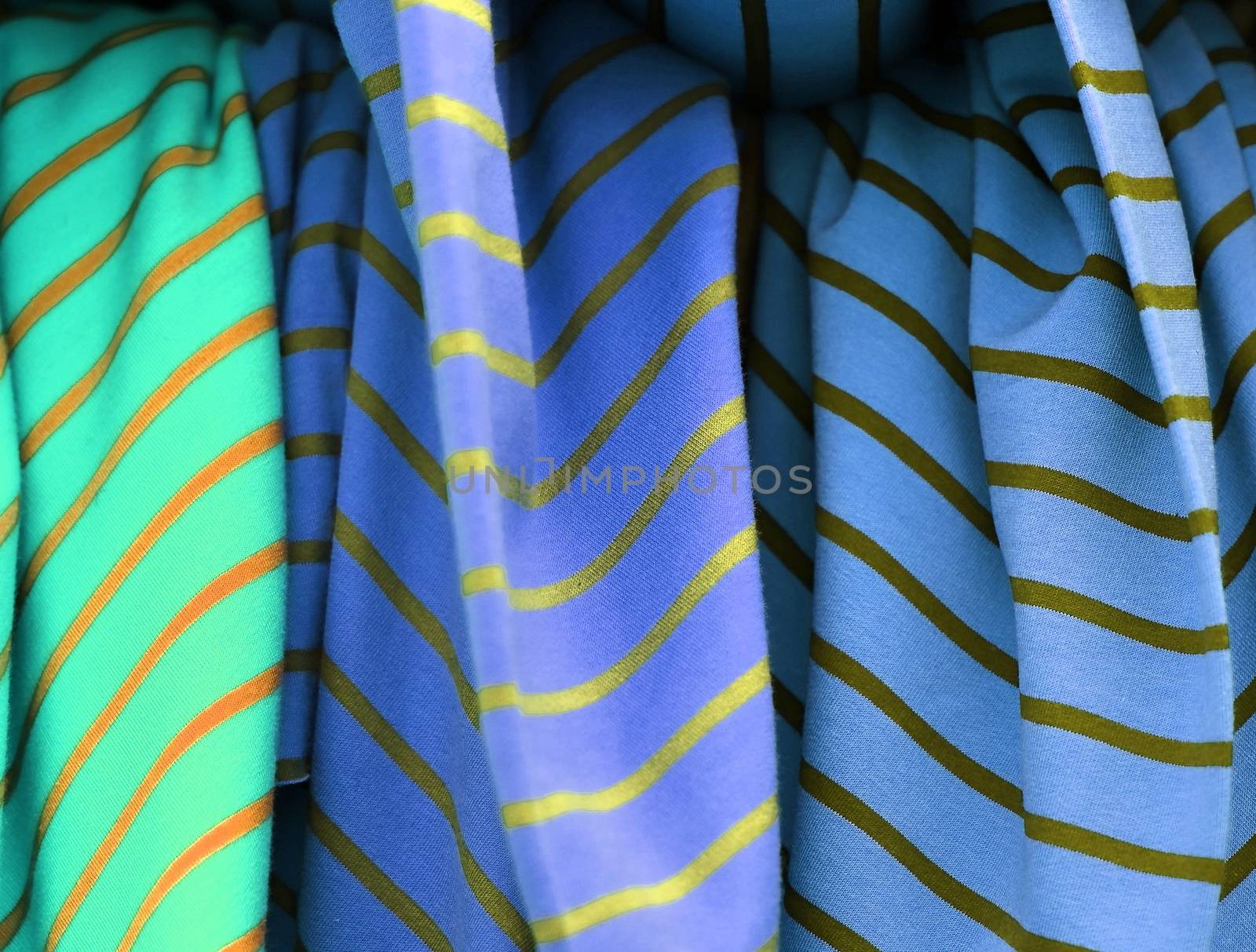 Detailed close up view on samples of cloth and fabrics in differ by MP_foto71