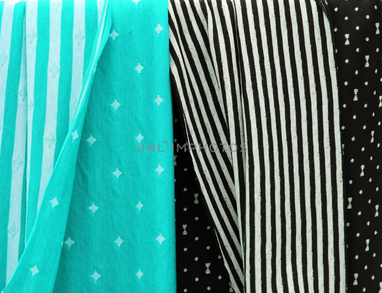 Detailed close up view on samples of cloth and fabrics in differ by MP_foto71