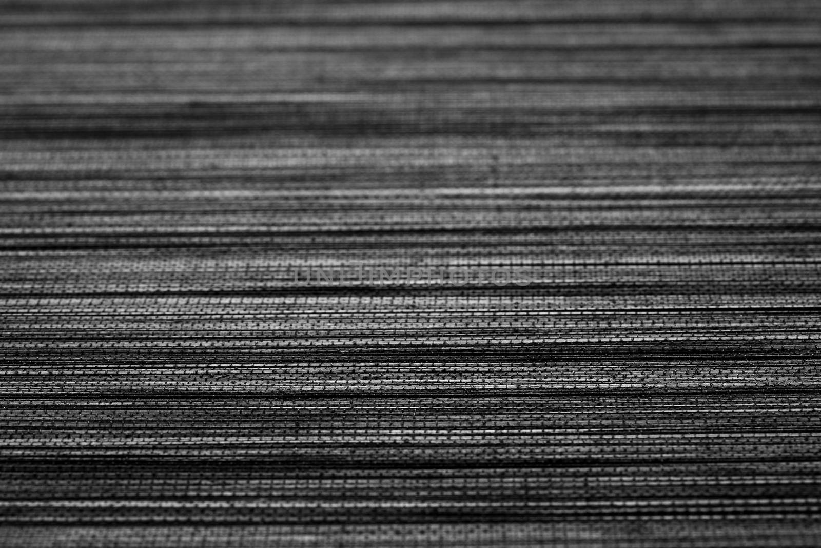 abstract texture of black bamboo mat for graphic design.