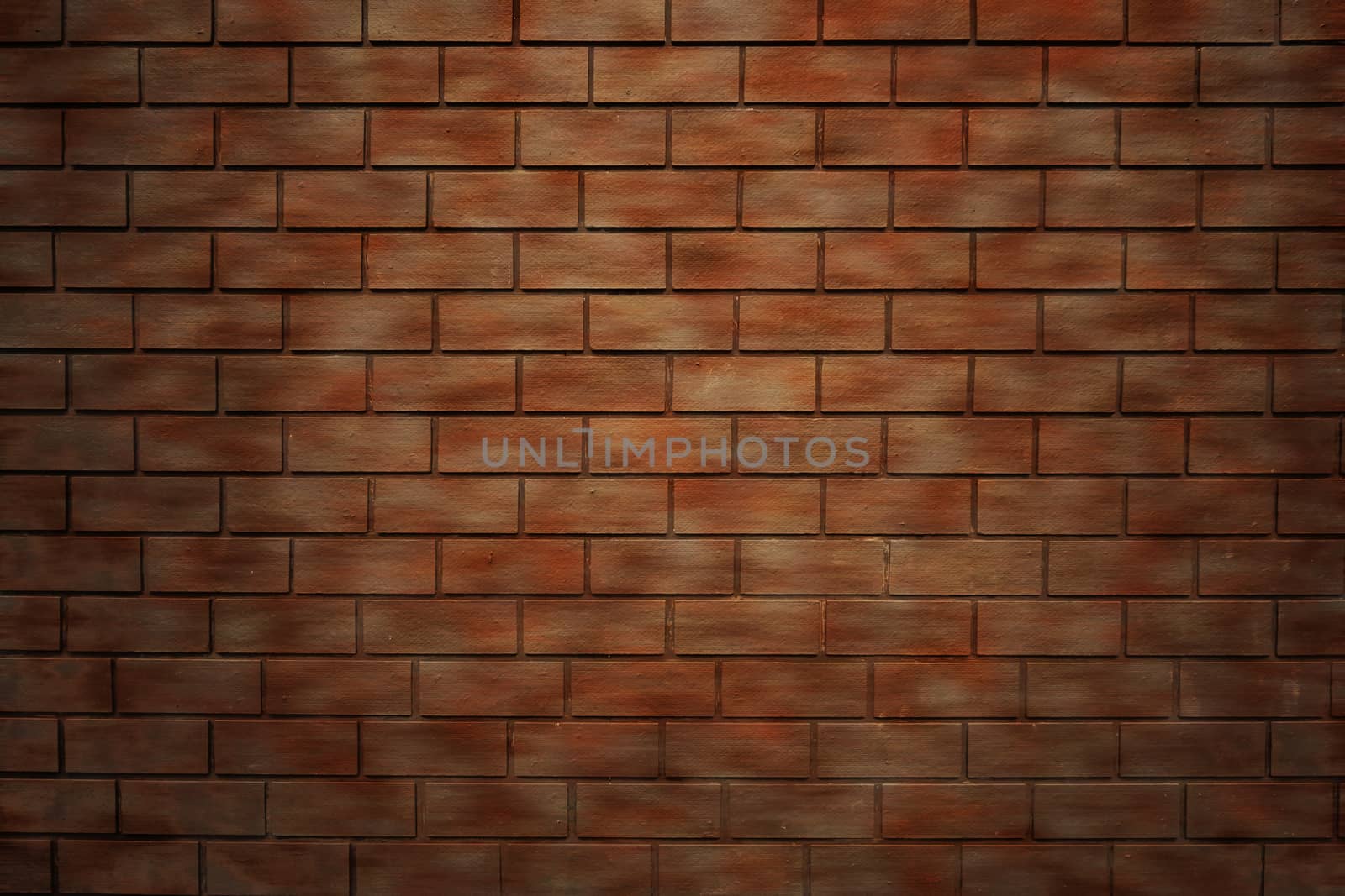Brown artificial brick wall texture background