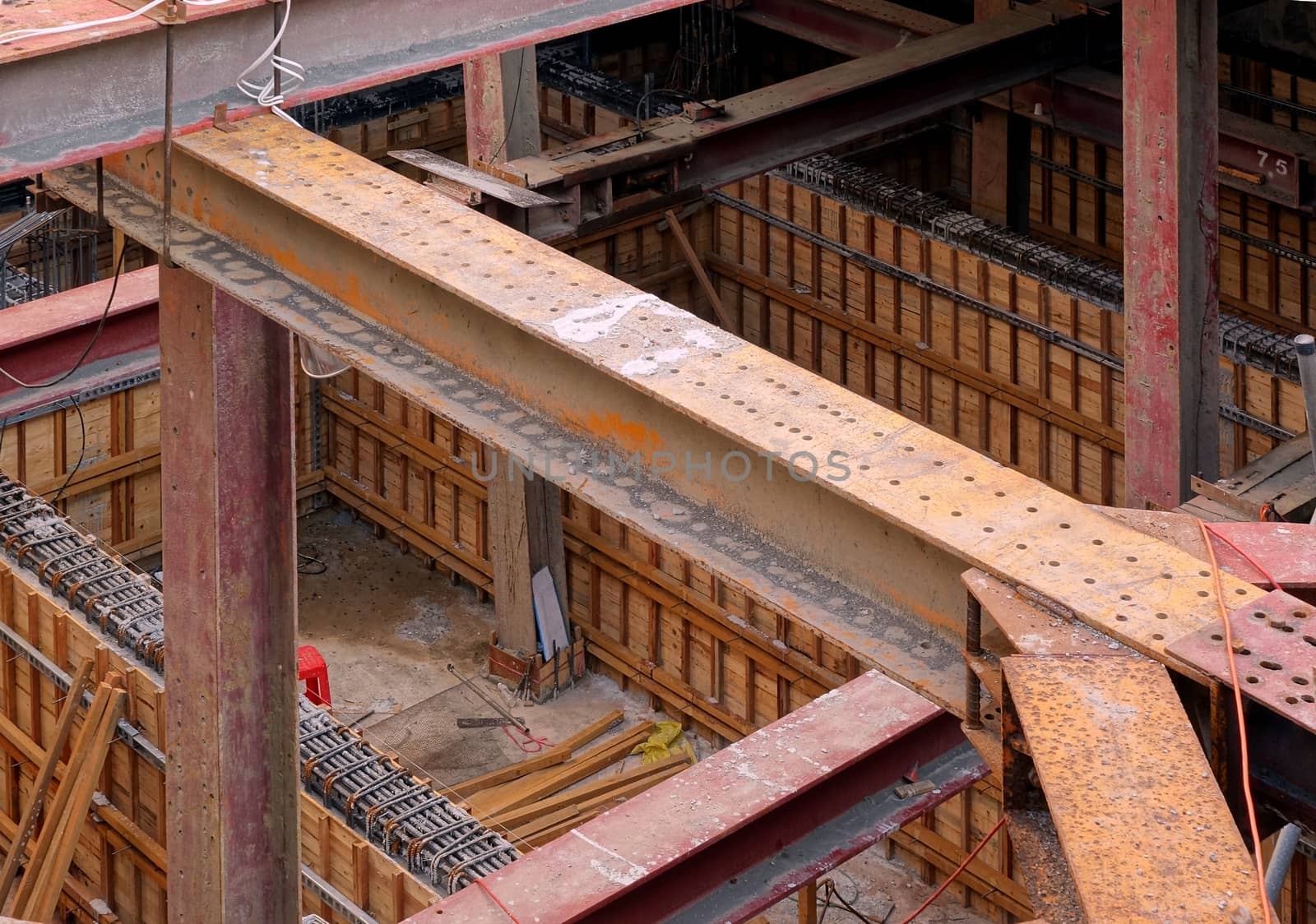 A large underground construction site with strong pillars and girders