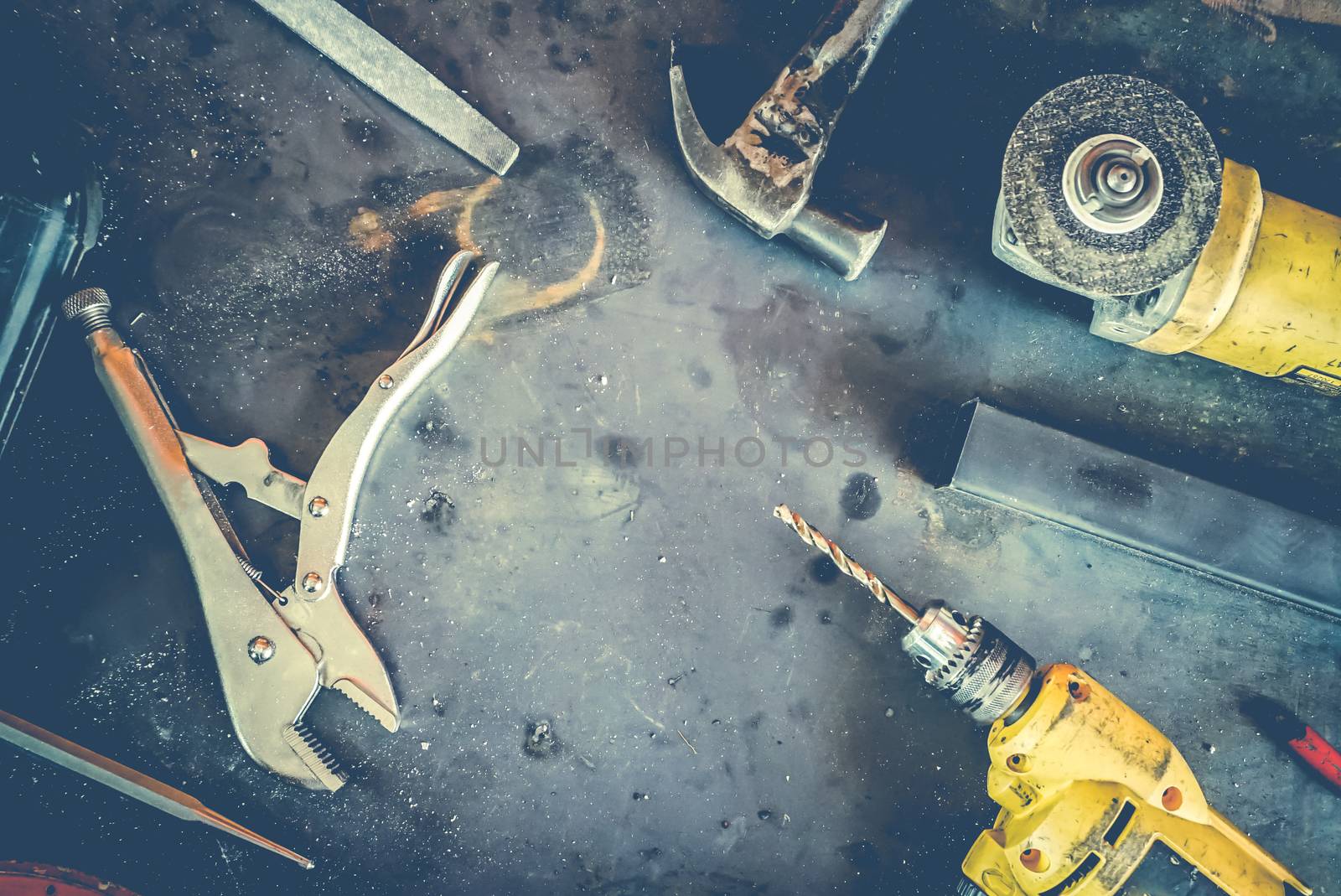 Many Tools on grunge table.View from above. Copy space.