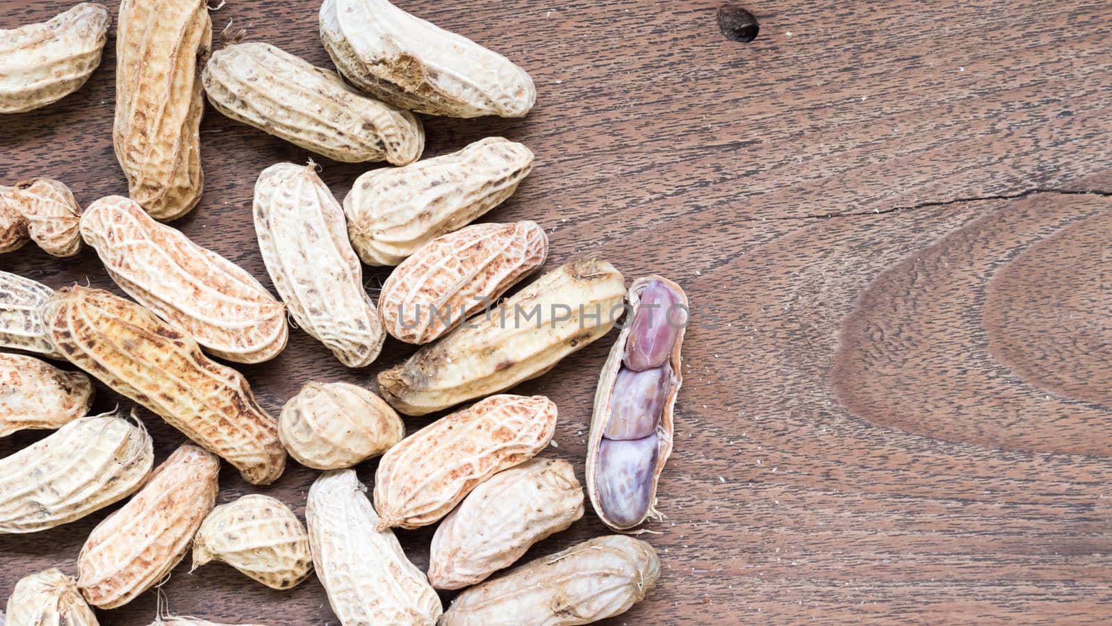 Boiled Peanuts on wooden table background.