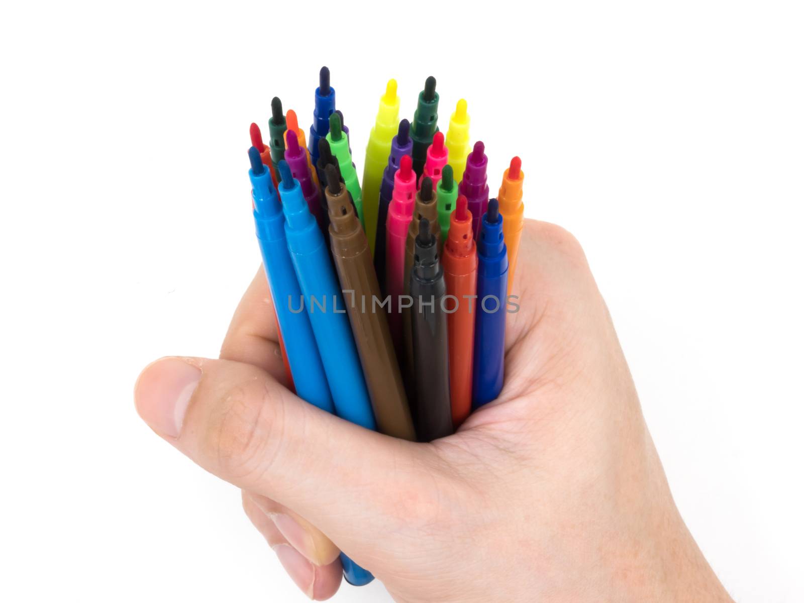 Multi-Color markers pens with hand on white background.