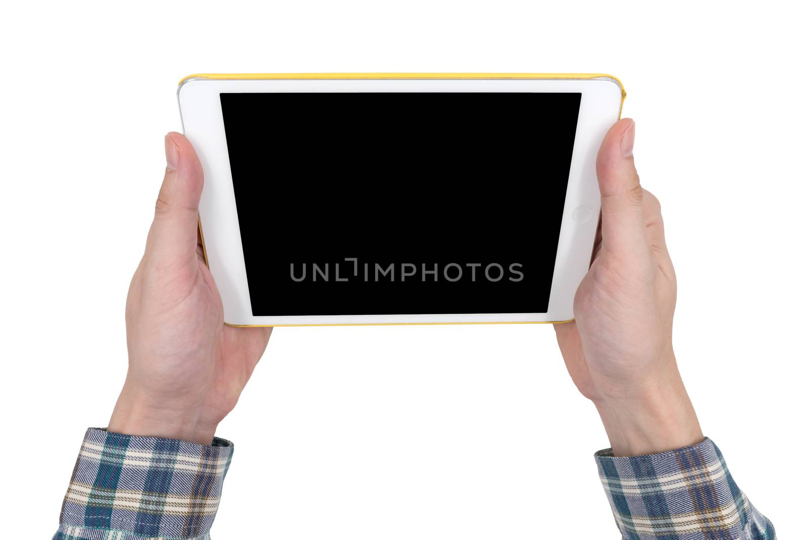 Male hands holding a white tablet touch computer gadget with touch blank black screen isolated on white background.