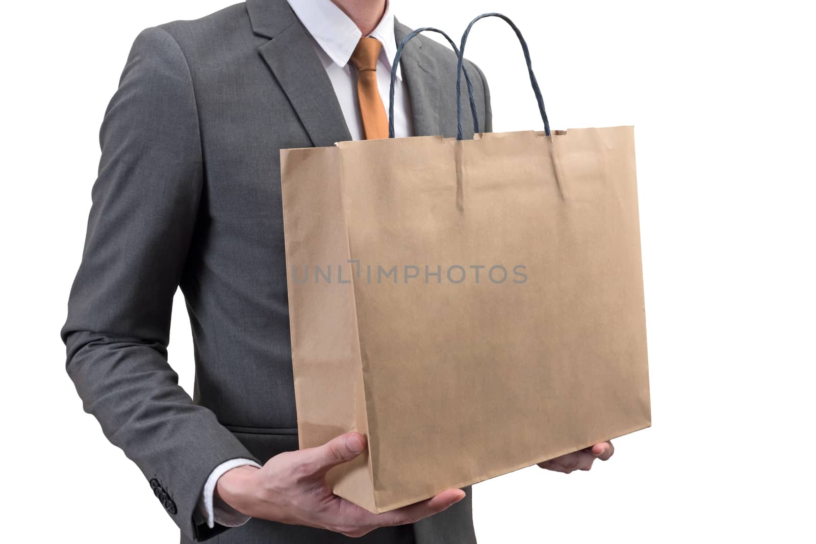 Businessman holding a shopping bag  isolated on white background.