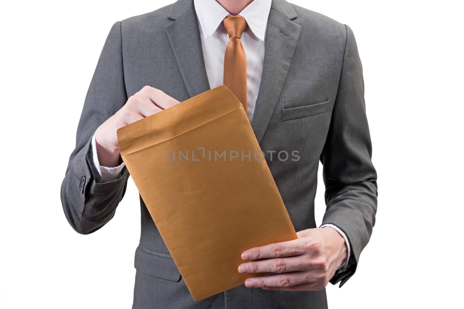Businessman holding an envelope  isolated on white background.