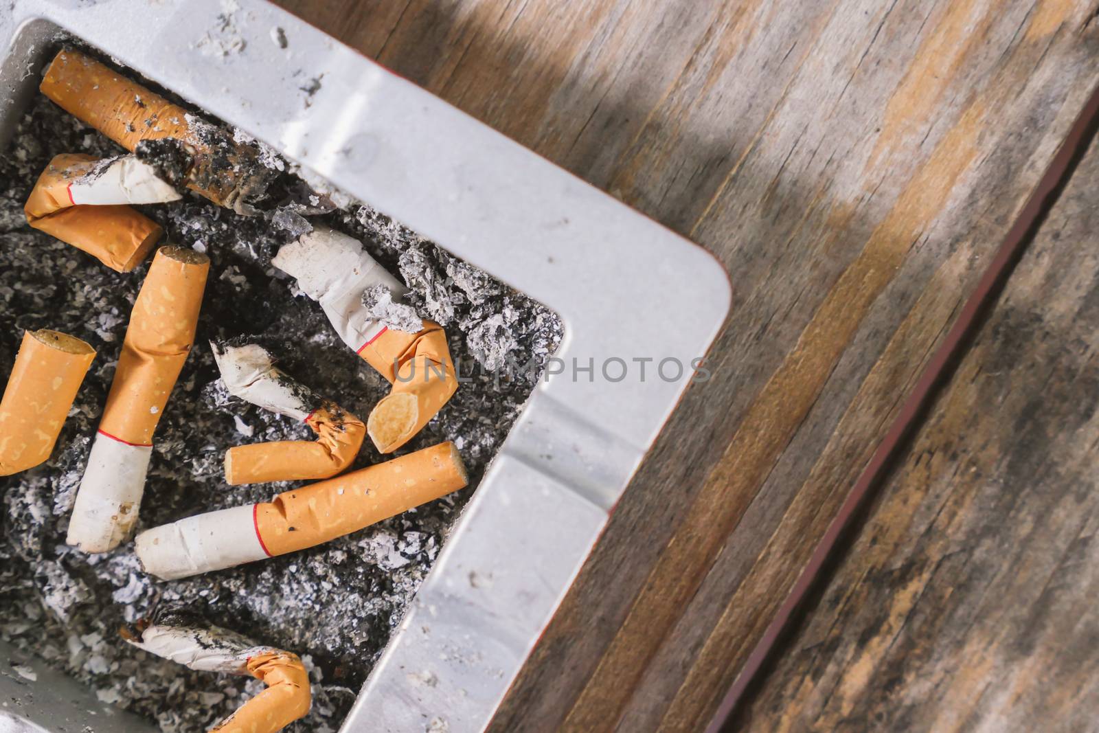Smoked Cigarettes Butts in ashtray