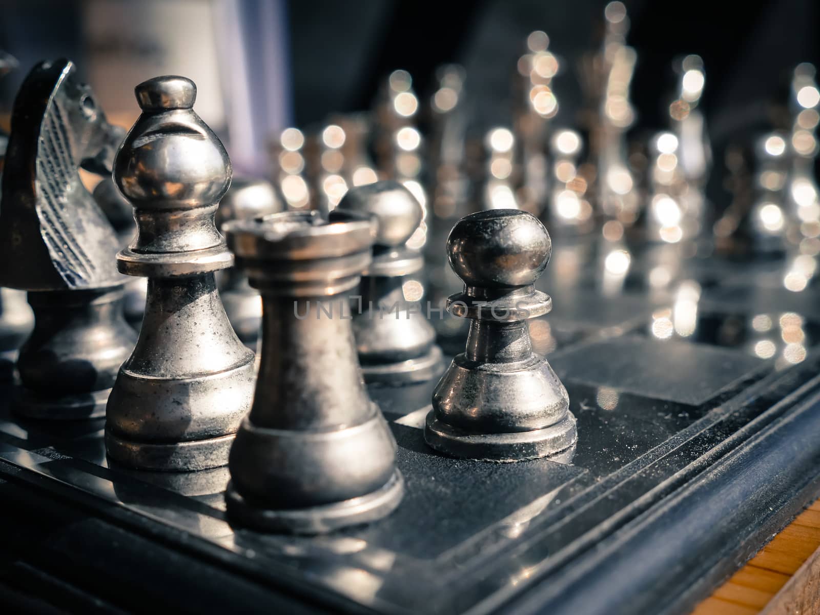 Chess pieces with chess board.Selective focus.retro filter.