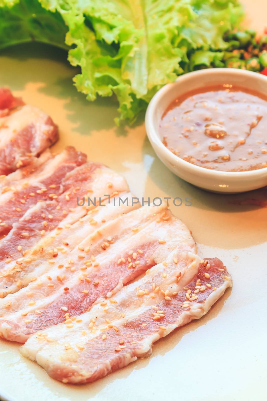 Raw pork slice for barbecue, Japanese food, Yakiniku by ronnarong