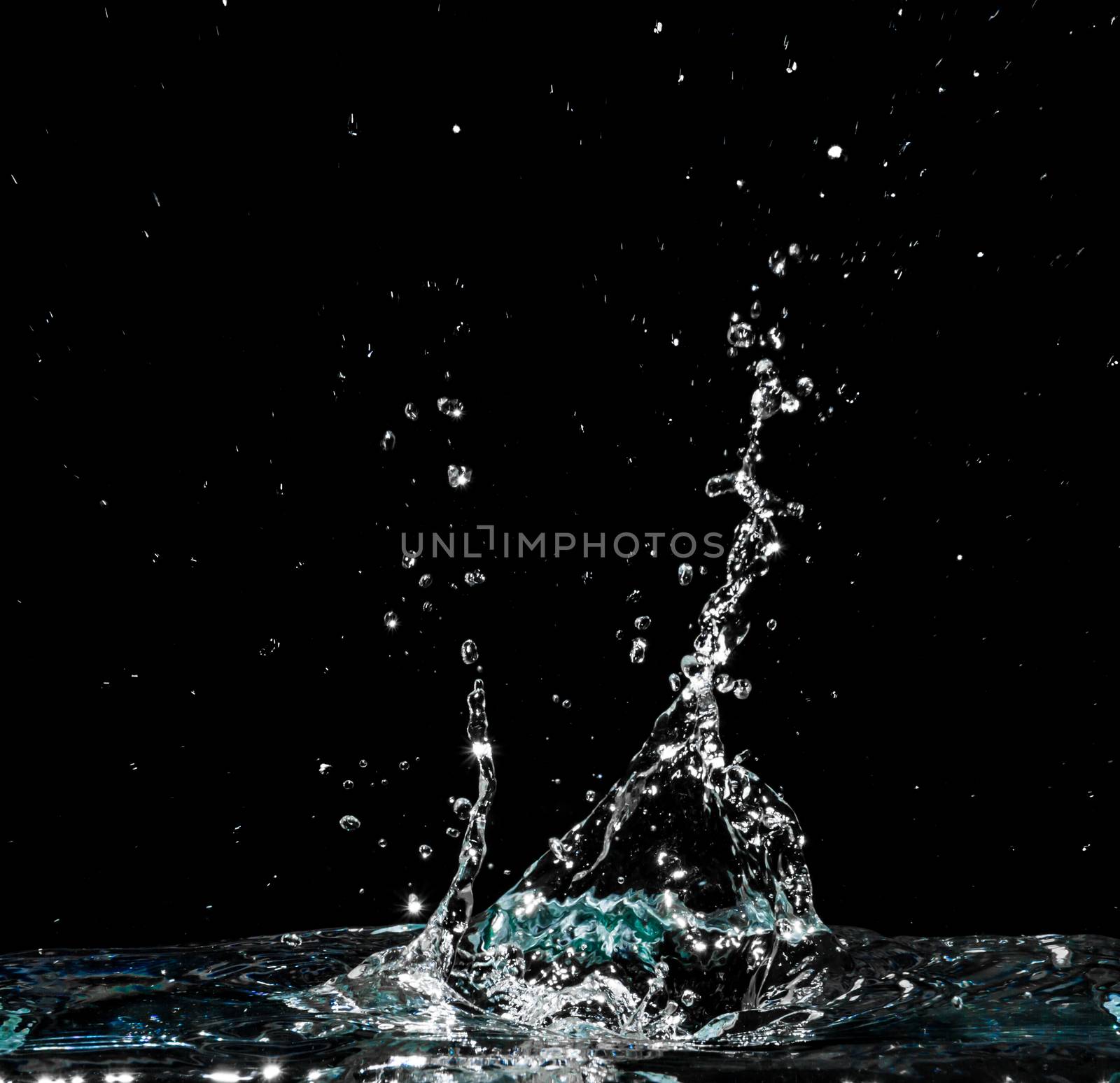 Water splash isolated on black background