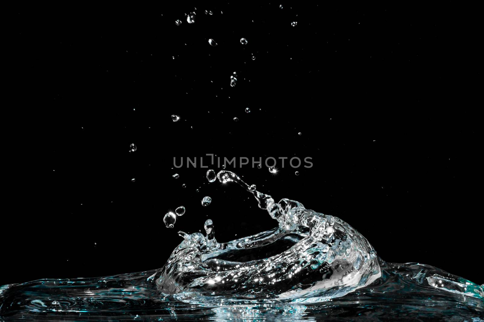 Water splash isolated on black background