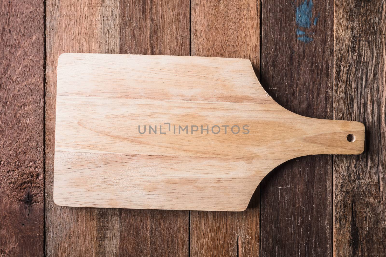 Top view of  wooden tray on wooden table background.