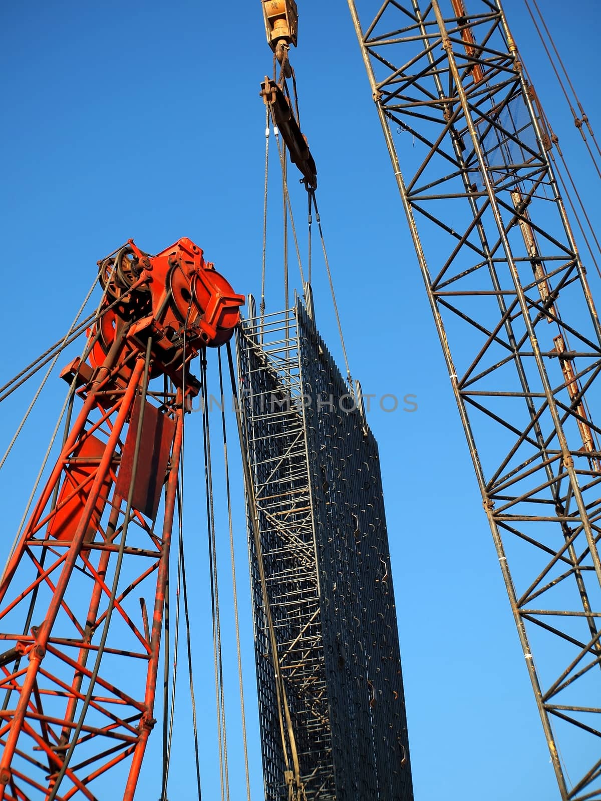 Busy Construction Site with Cranes by shiyali