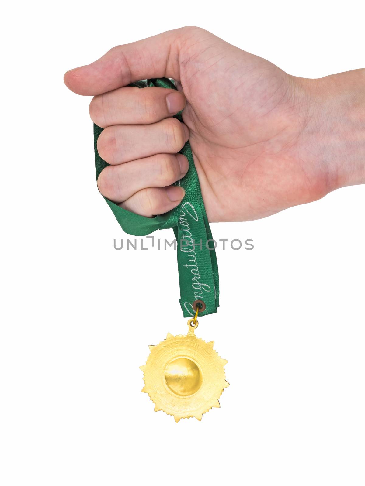 Hand holding Gold medal with green ribbon on white background