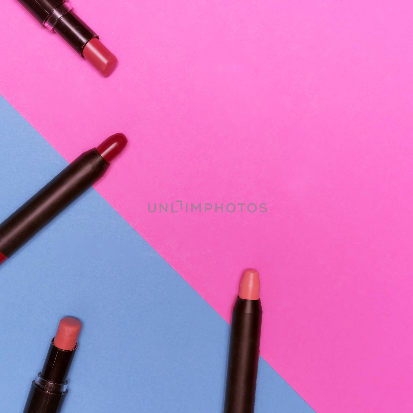 Lipsticks on colorful background.  Makeup and Beauty concept