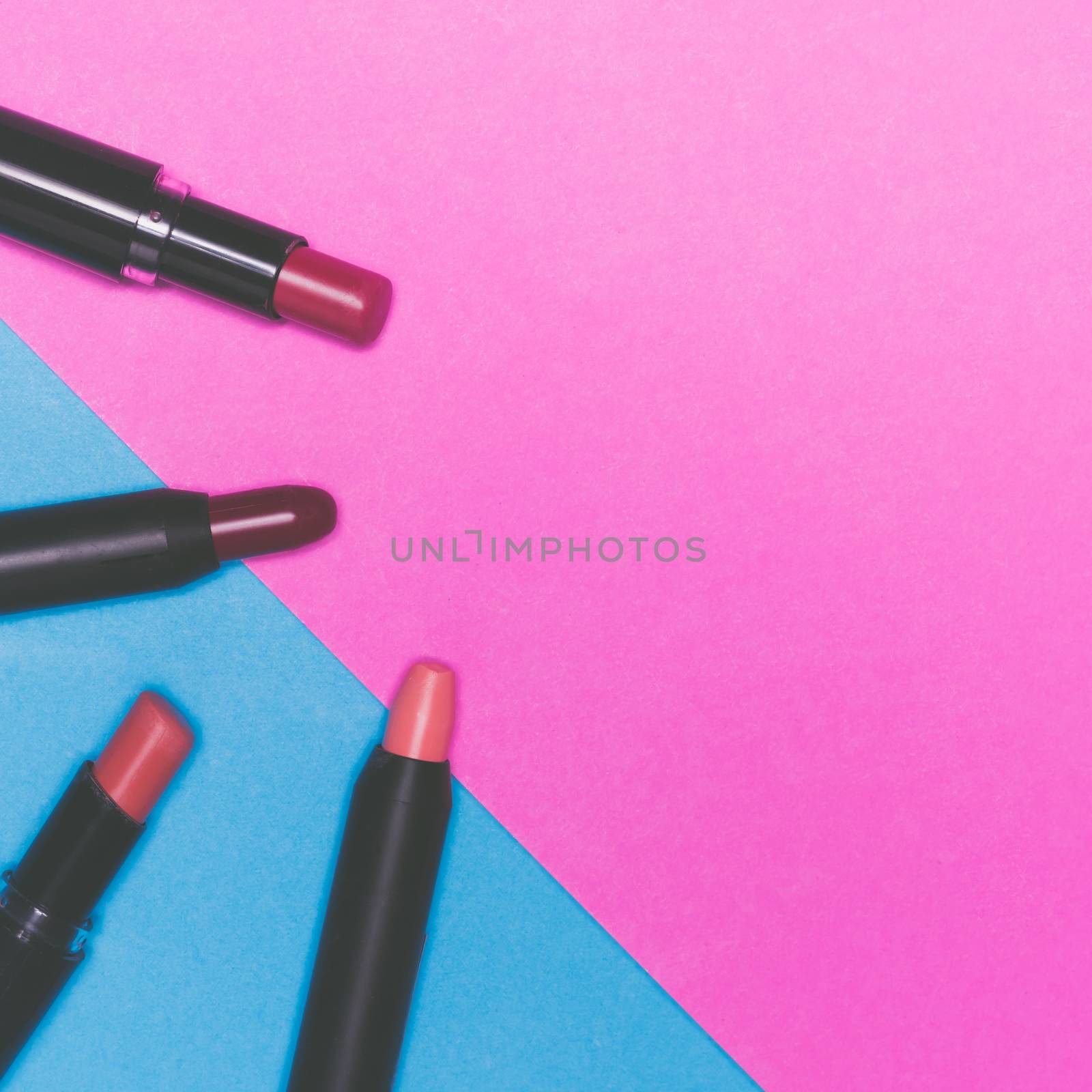 Lipsticks on colorful background.  Makeup and Beauty concept