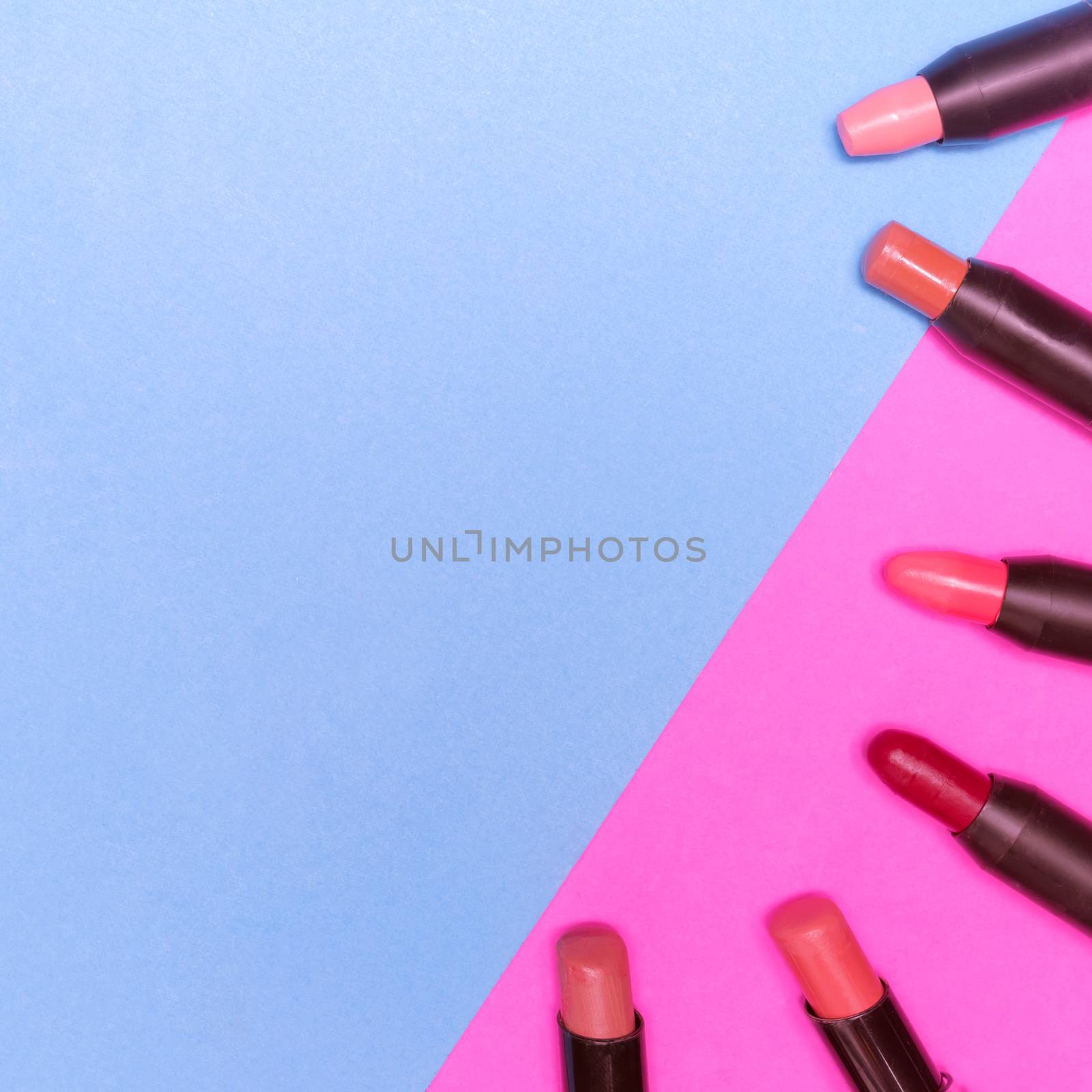 Lipsticks on colorful background.  Makeup and Beauty concept