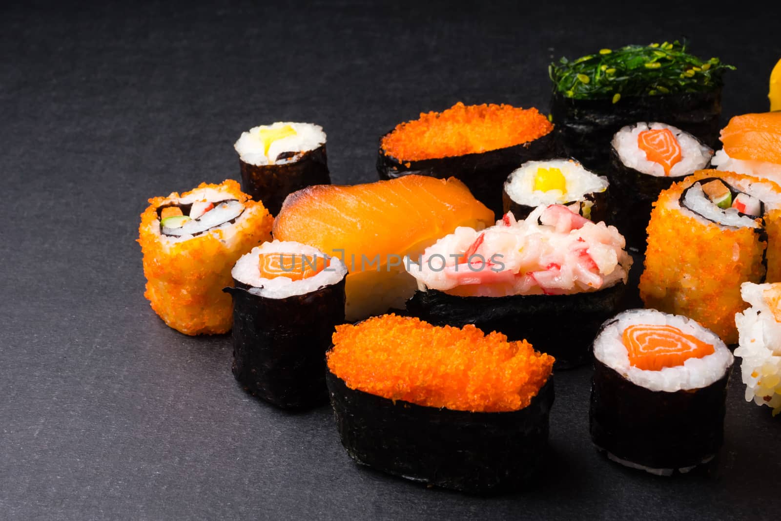 Sushi set on black background, Japanese food.