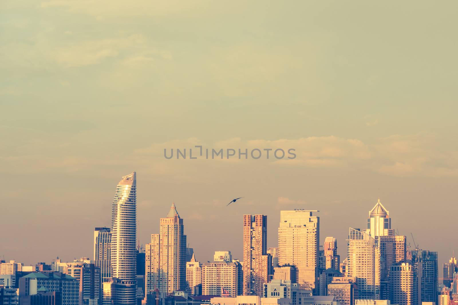Modern building in business district at Bangkok city, Thailand. Vintage tone