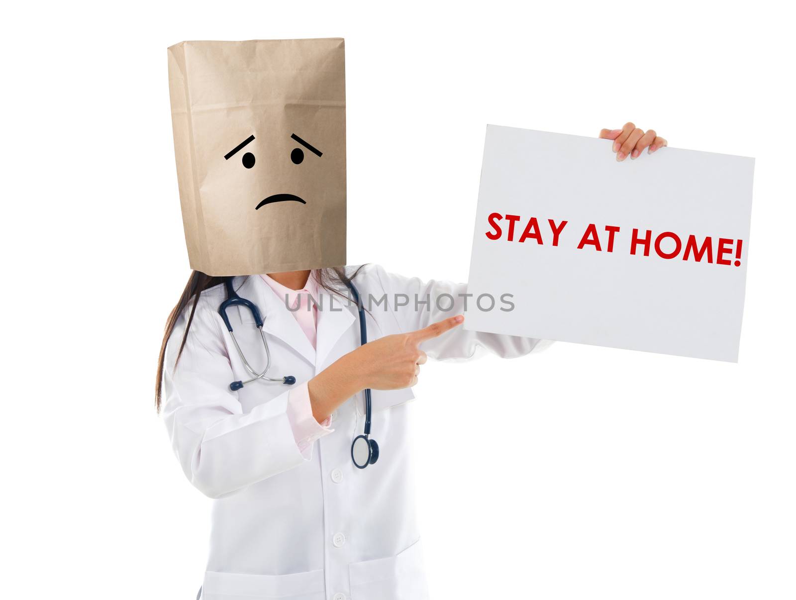 Medical staff holding a card with stay at home on it.
