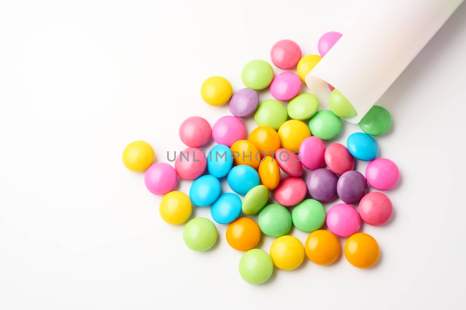 Colorful candies on a white background.