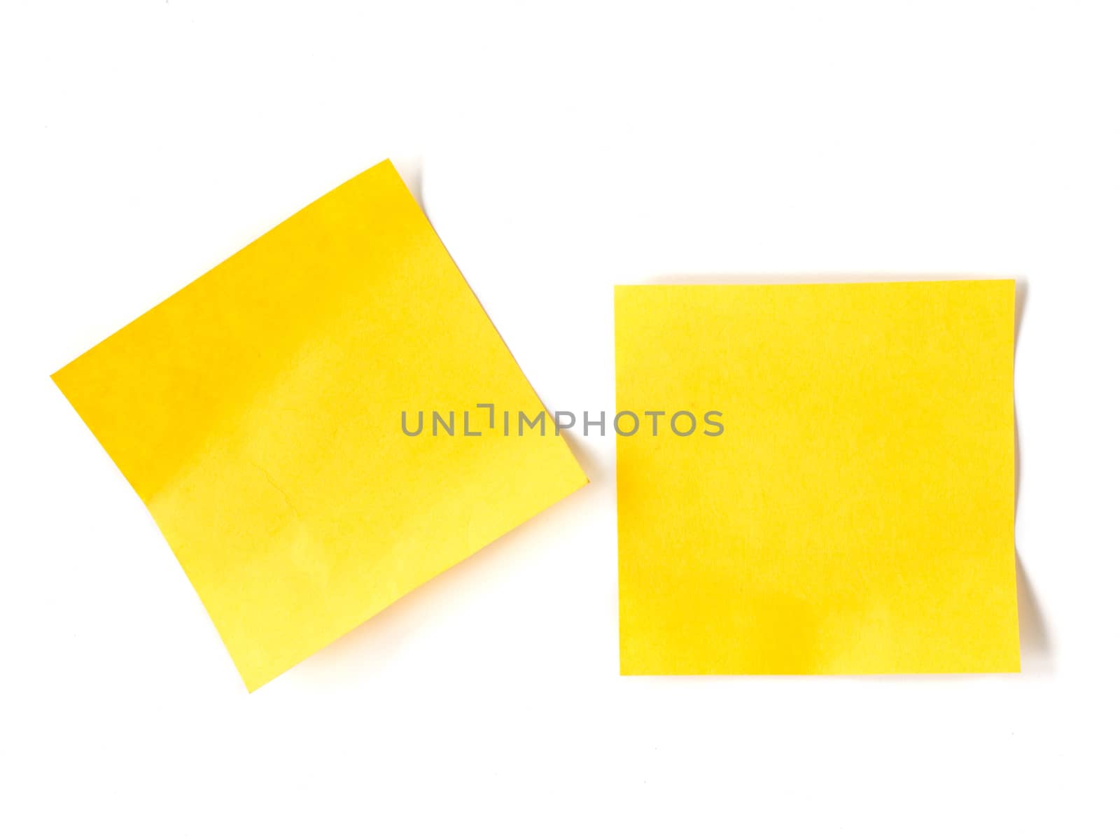 Yellow stick notes paper on white background.