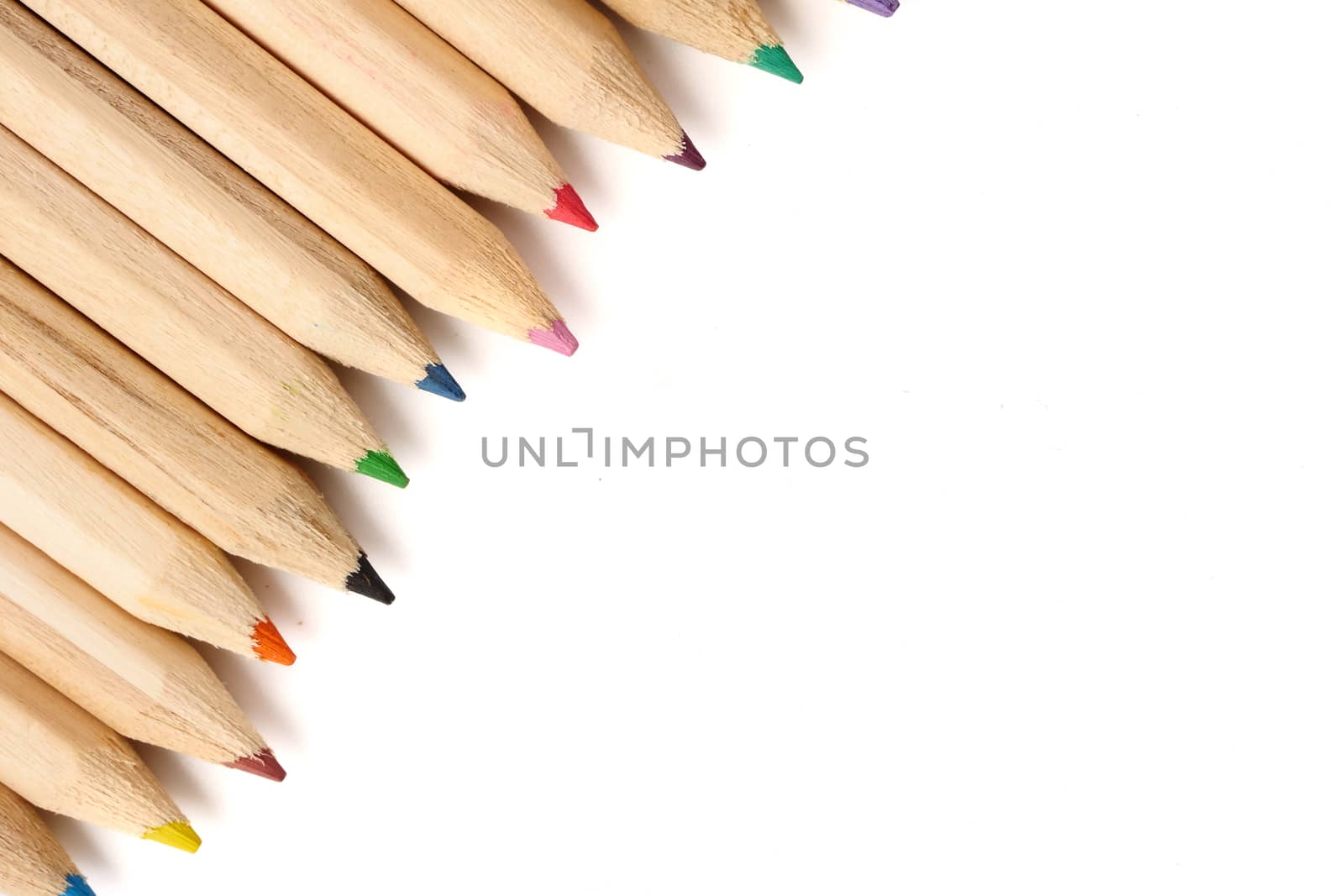 Color pencils on white background. Free space for text