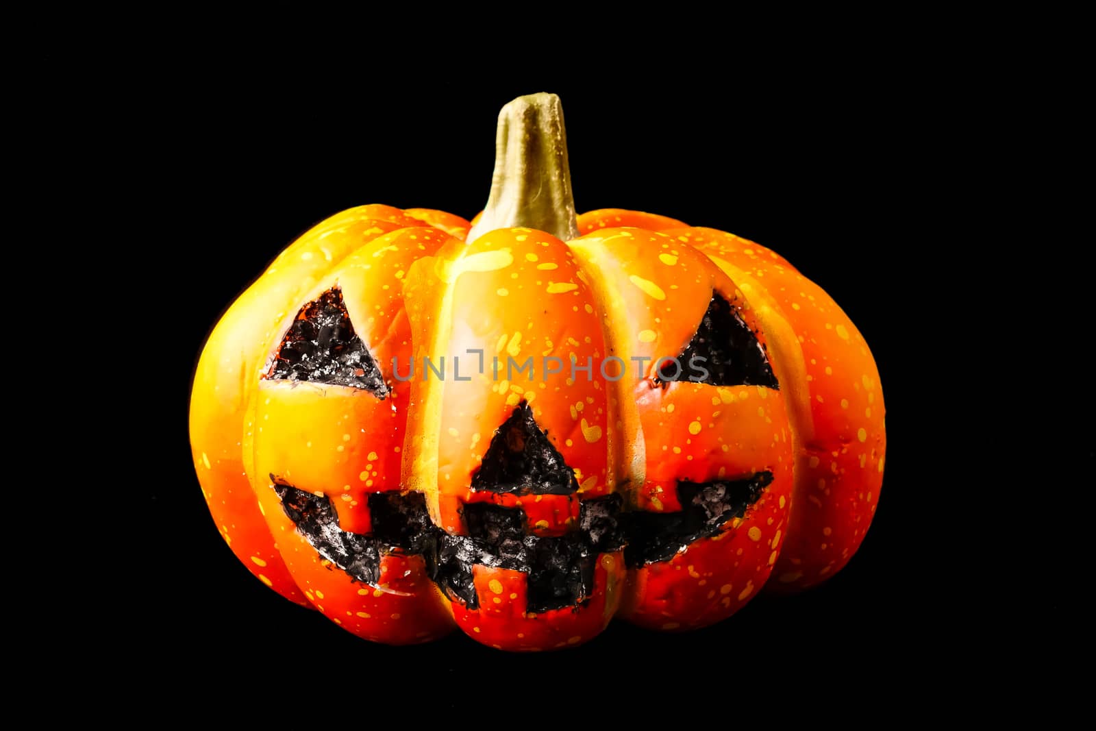 Halloween pumpkin on a black background.