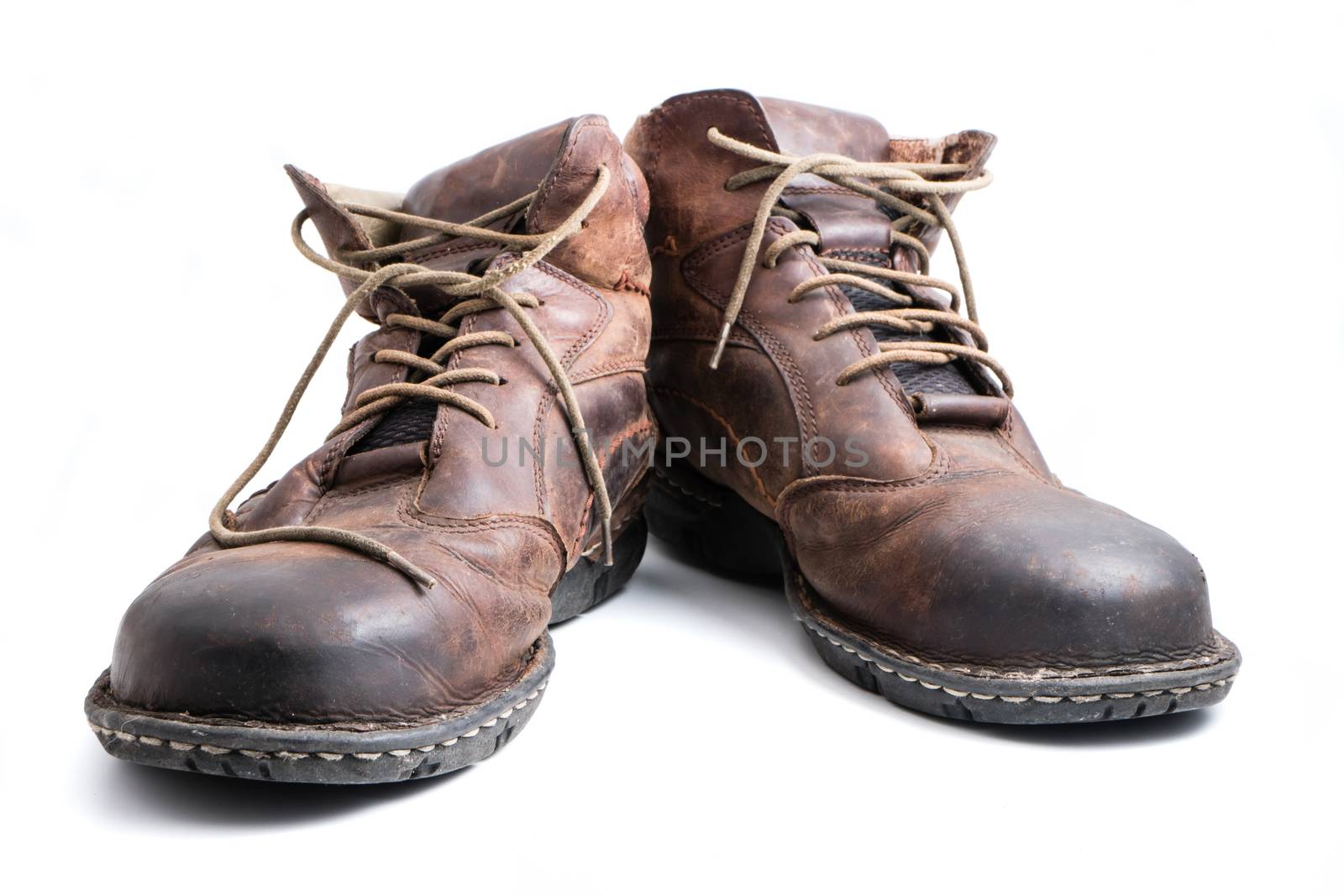 Men's brown leather shoes on white background.