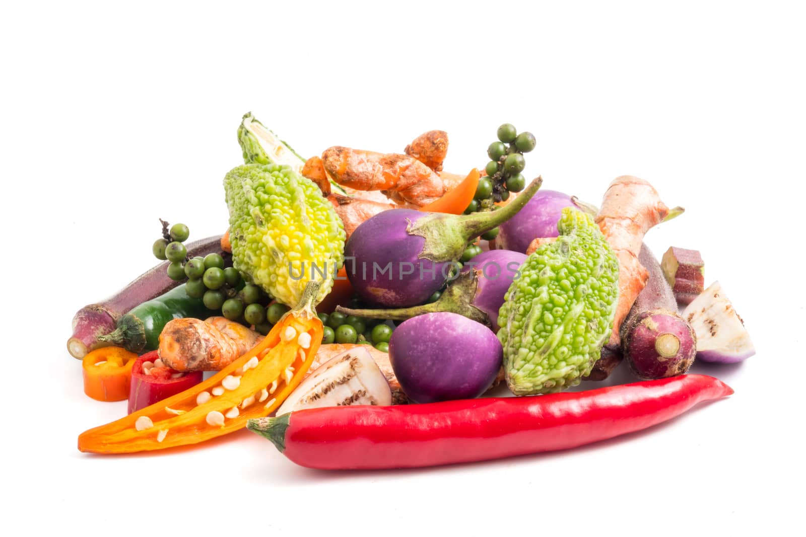 Group of fresh vegetables and herbs on white background.