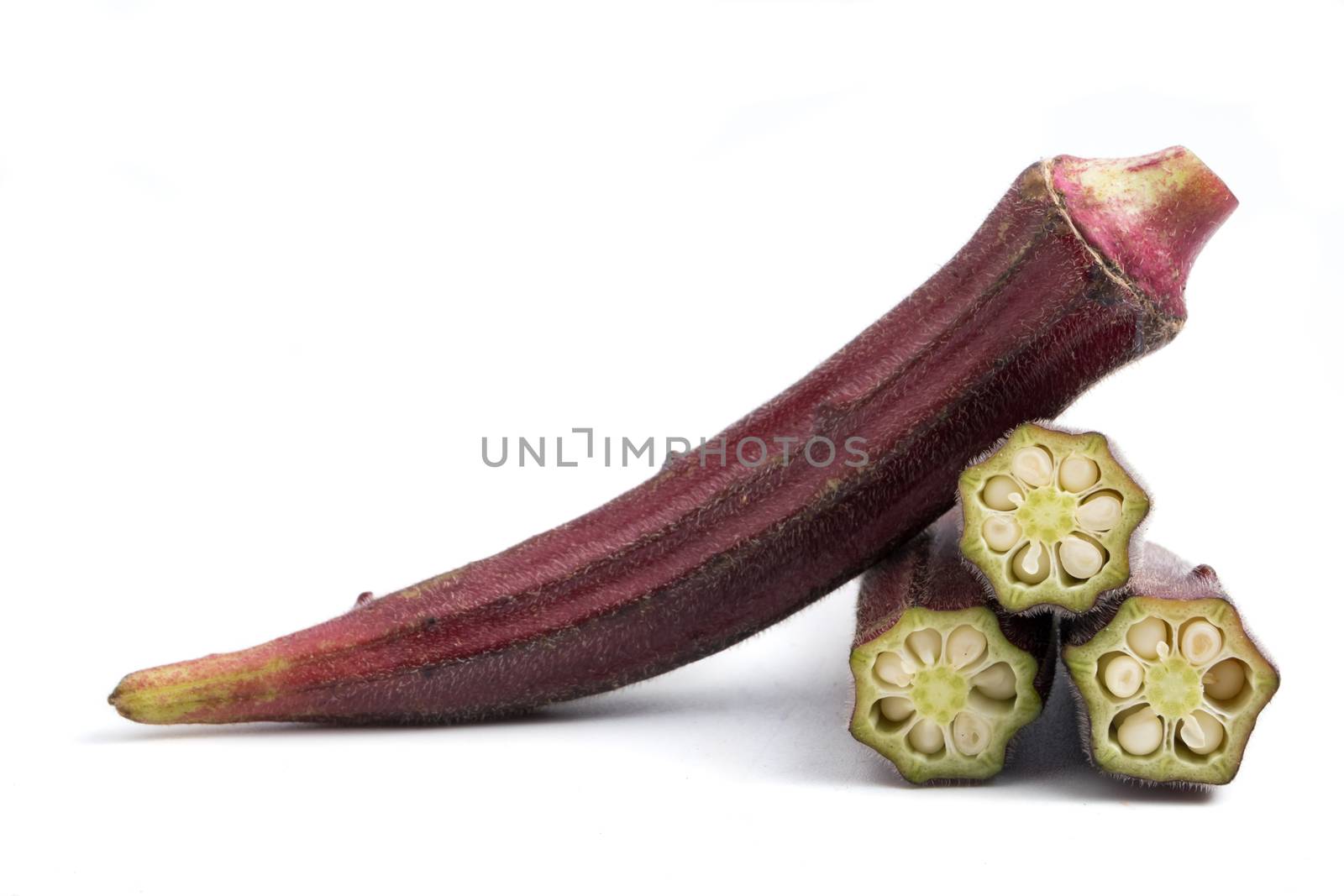 Fresh Red okra on white background. by ronnarong
