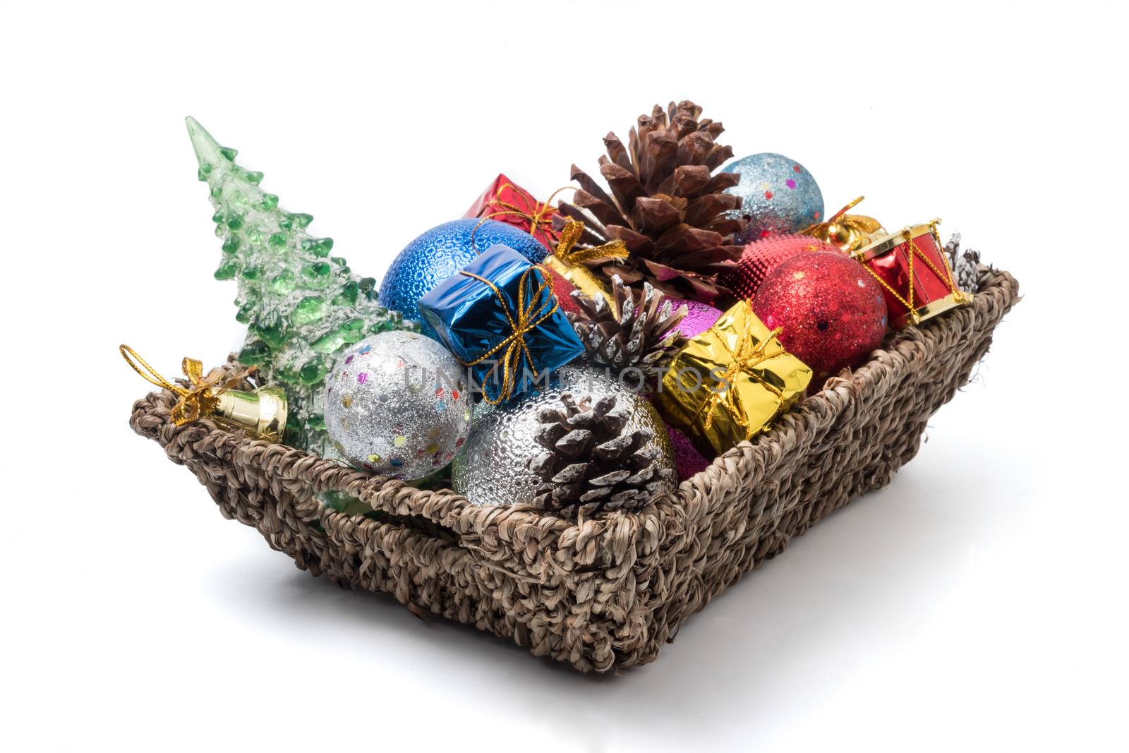 Christmas decoration in basket on white background. by ronnarong