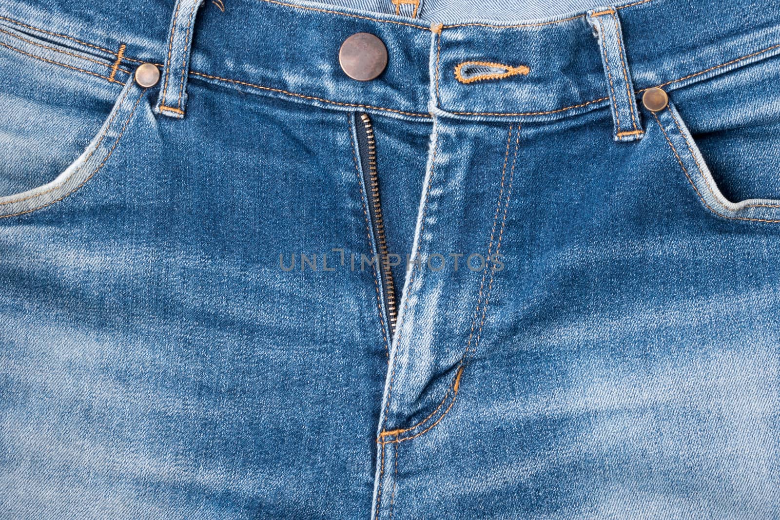 Close up of blue jeans pants, denim jeans background.
