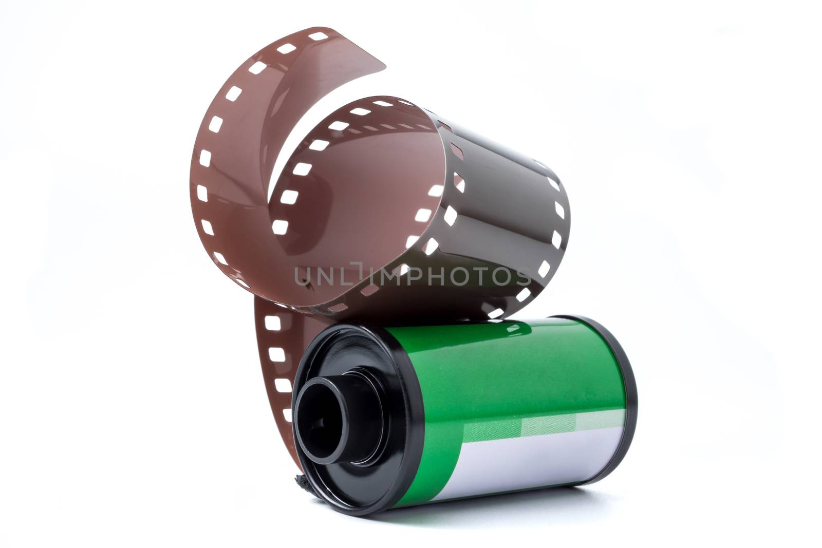 Photo film in cartridge, Photographic roll film 35 mm on a white background. by ronnarong