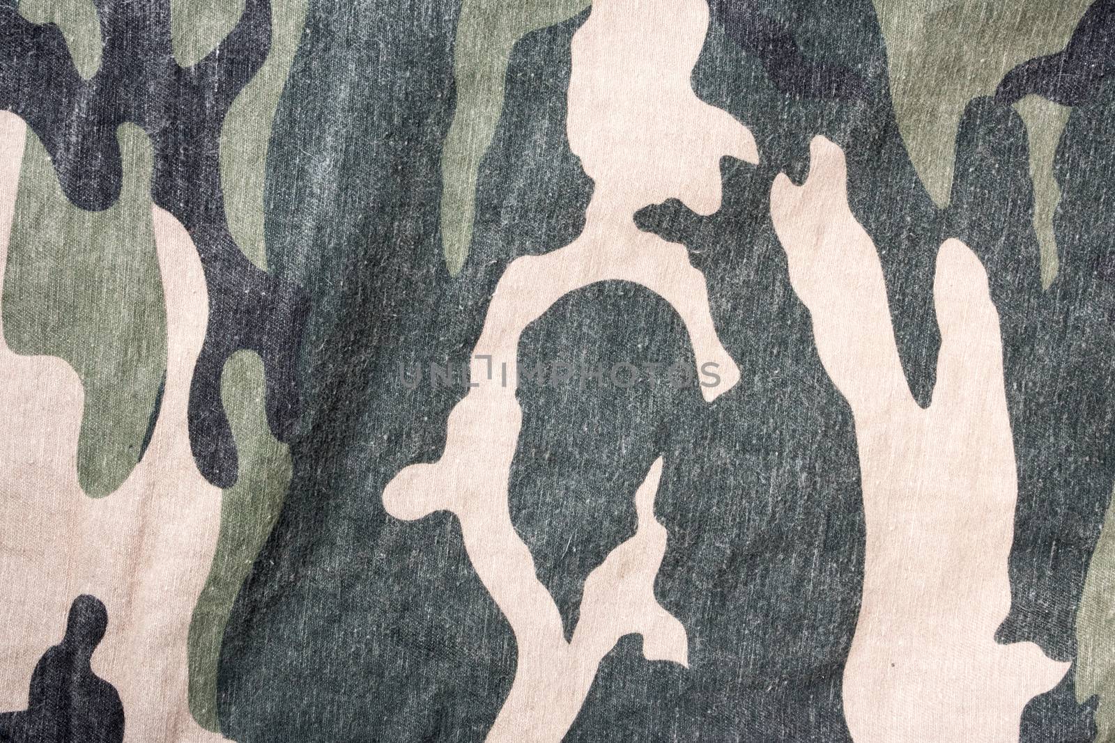 Camouflage fabric texture pattern background.