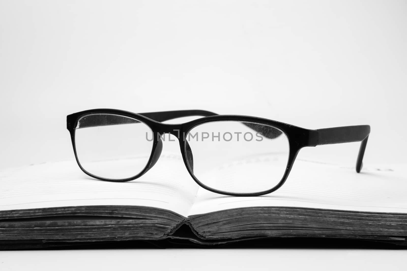 Eyeglasses on an open book, Black and White tone