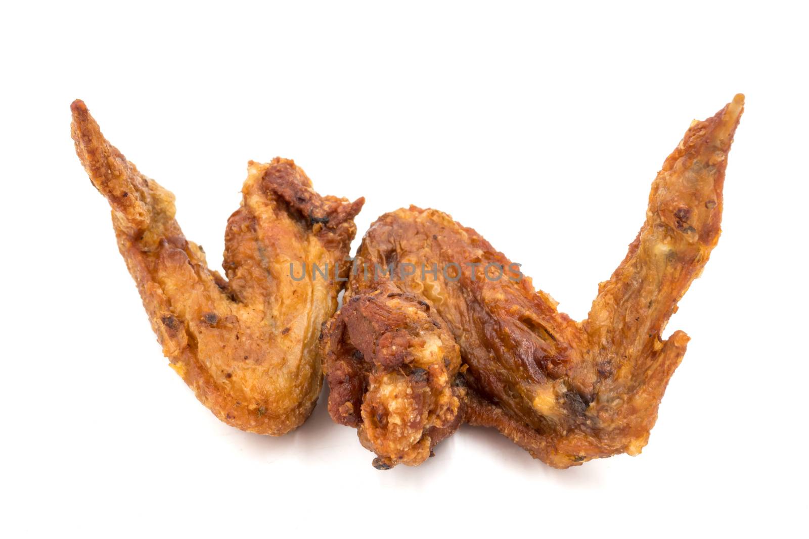 Fried chicken wings on a white background.