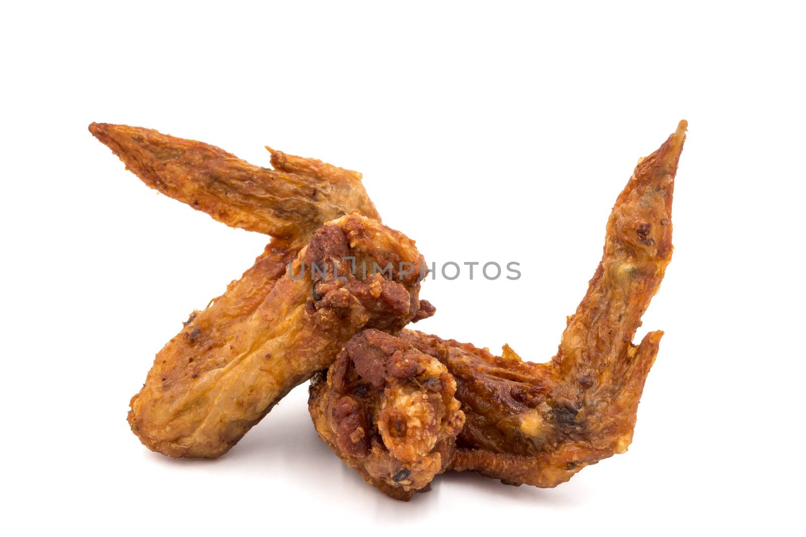 Fried chicken wings on a white background.