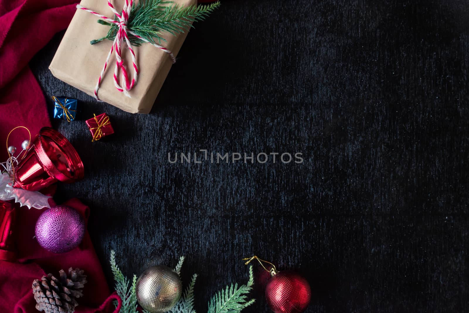 Top view of Christmas decorations on black background. Free space for text