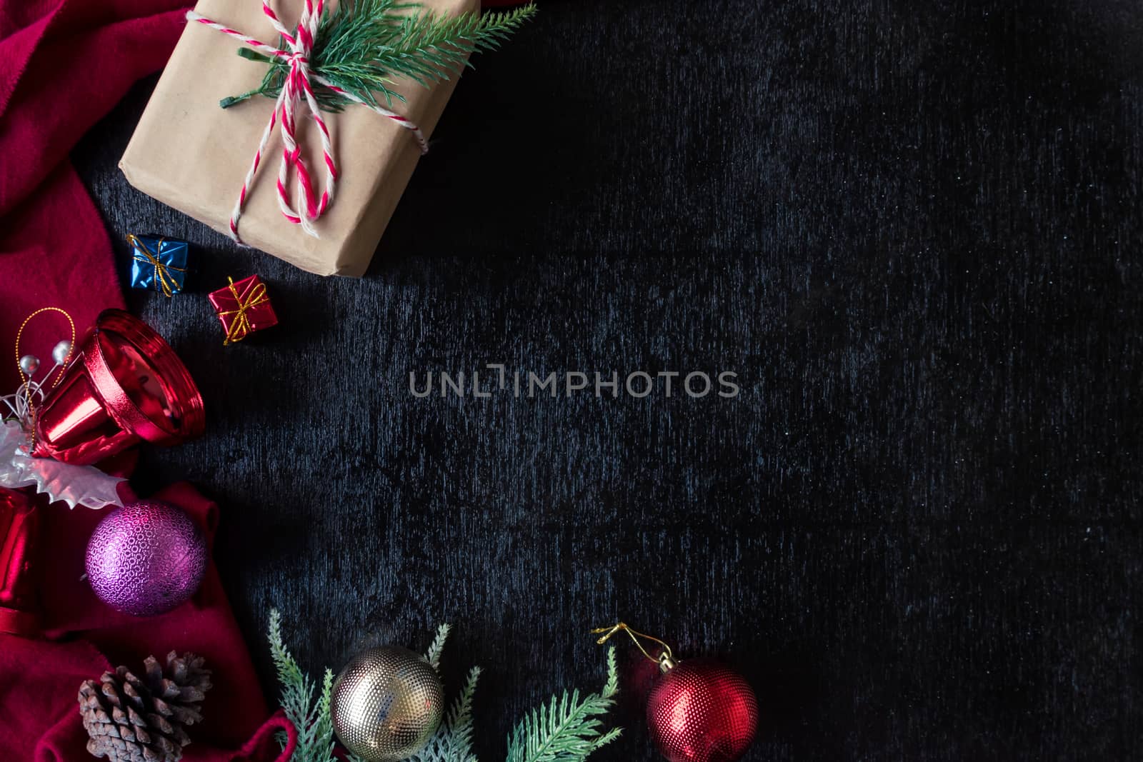 Top view of Christmas decorations on black background. Free space for text