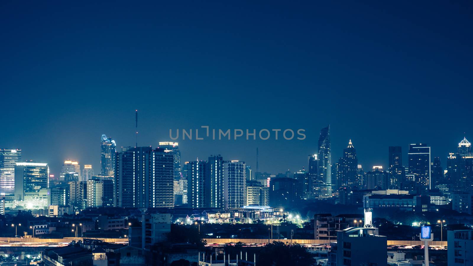 View of the business area in Bangkok at night, Bangkok is the ca by ronnarong
