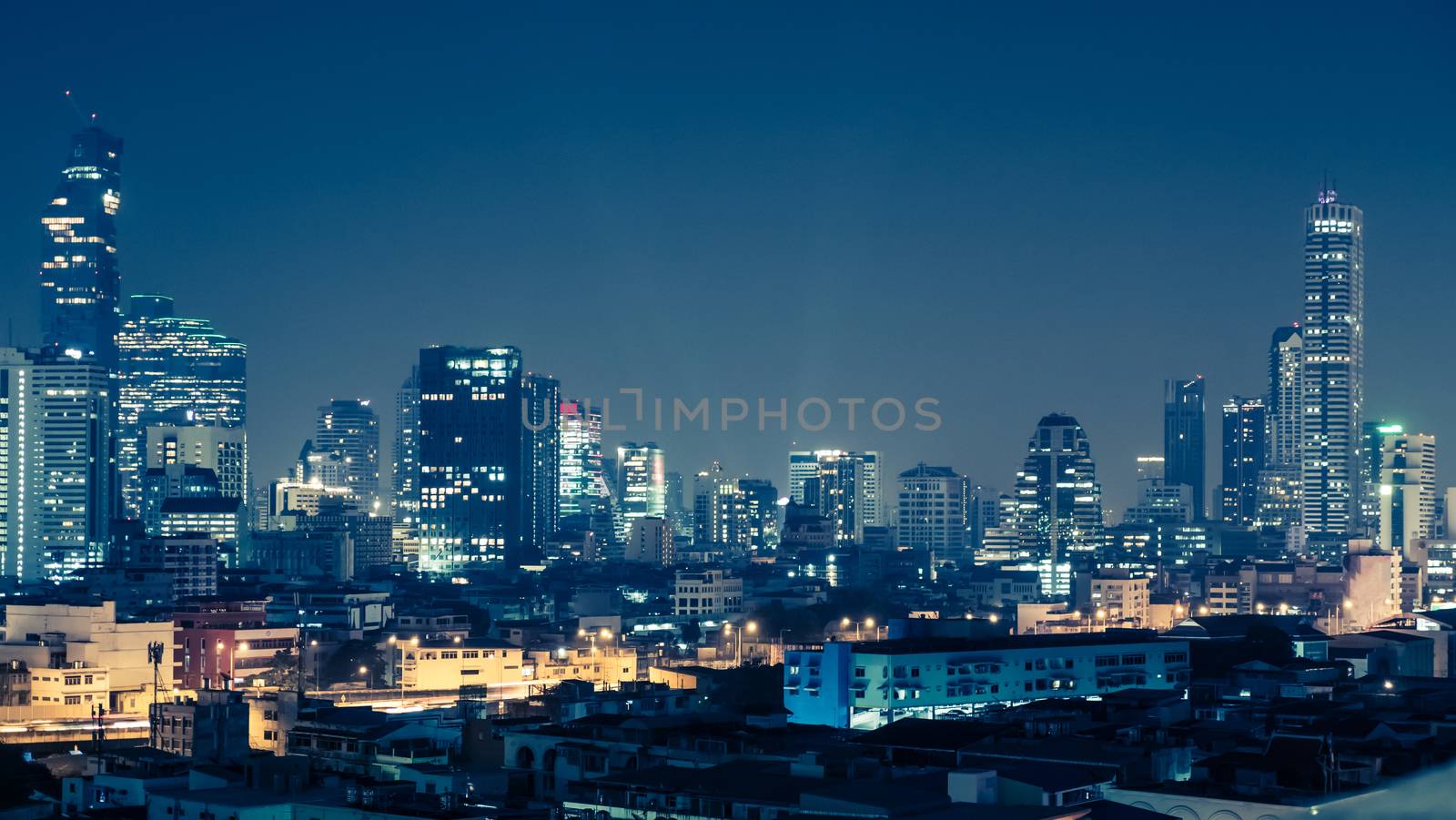 View of the business area in Bangkok at night, Bangkok is the ca by ronnarong