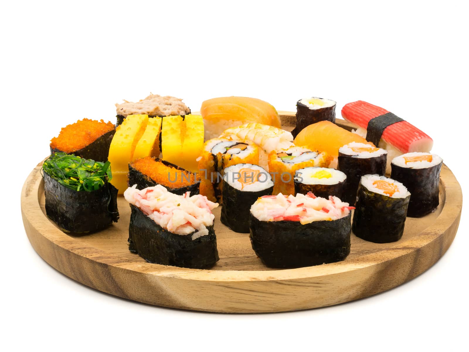 Sushi set on wooden plate on white background, Japanese food. by ronnarong