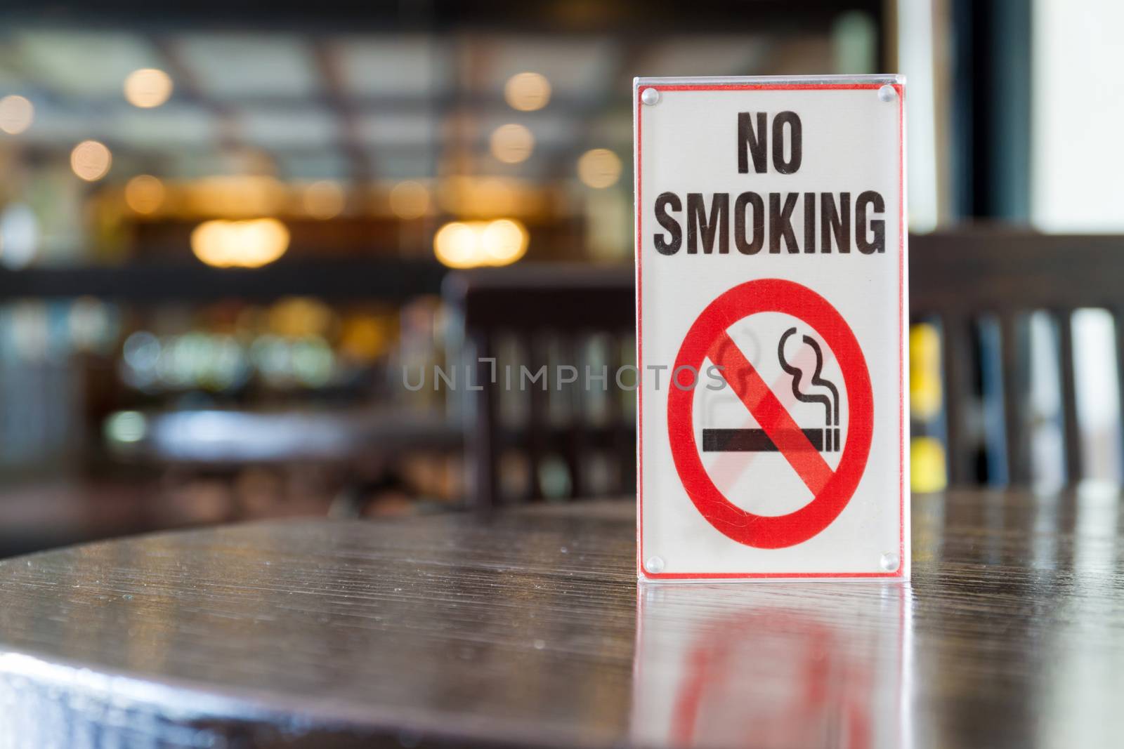 Signs of non smoking in restaurant . by ronnarong