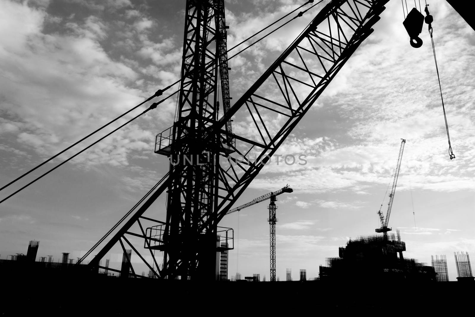 The building construction site silhouettes. by ronnarong