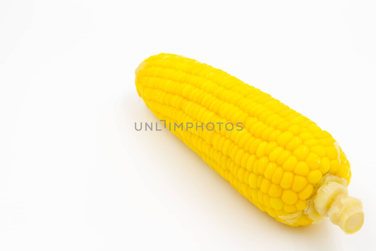 Boiled corn on white background  by ronnarong