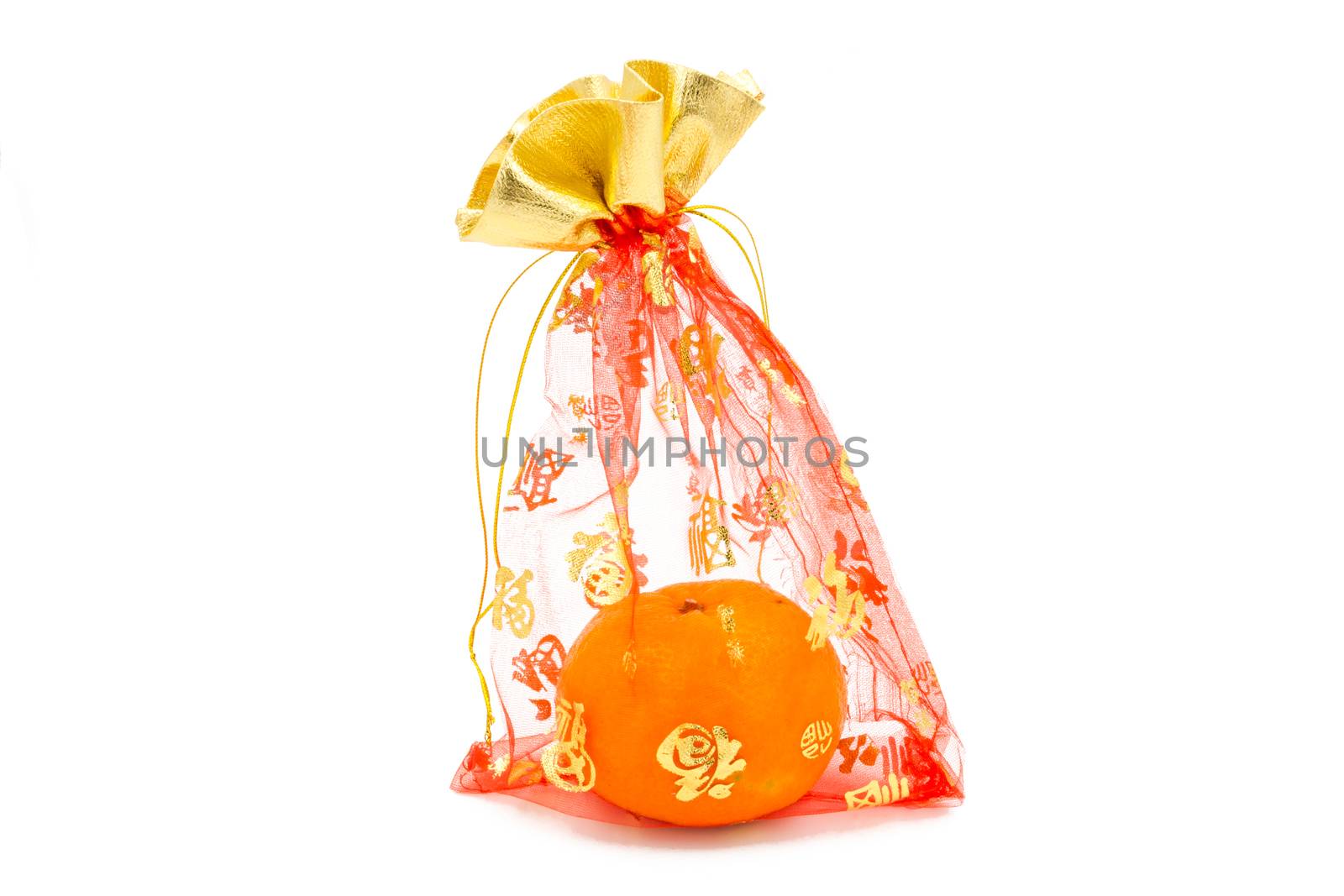 concept image of the chinese new year -mandarin orange in the red auspicious bag